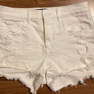 White distressed shorts